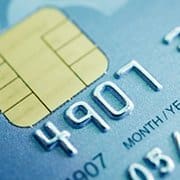 Low key macro shot with old credit card.